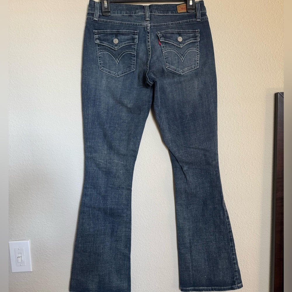Levi’s 524 Too Superlow 7M Blue Bootcut Women's Jeans w/distressed details